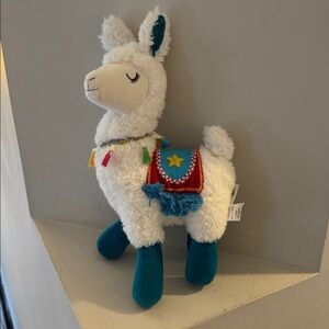 Pier 1 Fluffy Llama Plush with rainbow tassels